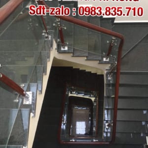 Cầu thang kính cường lực tay vịn gỗ, tay vịn inox. Cầu thang lan can kính đẹp nhất tại Hà Nội Cầu thang kính cường lực tay vịn gỗ, tay vịn inox. Cầu thang lan can kính đẹp nhất tại Hà Nội