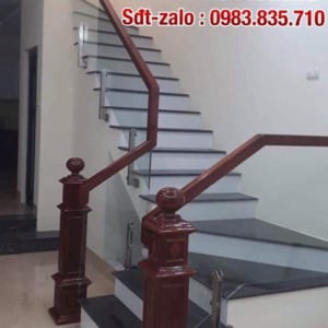 Cầu thang kính cường lực tay vịn gỗ. Báo giá cầu thang kính đẹp tại Hà Nội Cầu thang kính cường lực tay vịn gỗ. Báo giá cầu thang kính đẹp tại Hà Nội