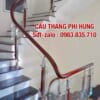 Cầu thang kính lan can kính cường lực tay vịn gỗ