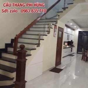 Cầu thang kính cường lực tay vịn gỗ, inox. Cầu thang kính đẹp hiện đại tại Hà Nội Cầu thang kính cường lực tay vịn gỗ, inox. Cầu thang kính đẹp hiện đại tại Hà Nội