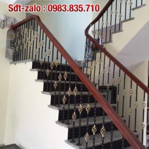 Cầu thang sắt tay vịn gỗ tại Hà Nội. Cầu thang sắt nghệ thuật đẹp Cầu thang sắt tay vịn gỗ tại Hà Nội. Cầu thang sắt nghệ thuật đẹp