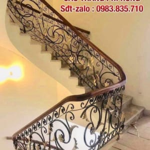 Cầu thang sắt nghệ thuật, báo giá cầu thang sắt tay vịn gỗ Cầu thang sắt nghệ thuật, báo giá cầu thang sắt tay vịn gỗ