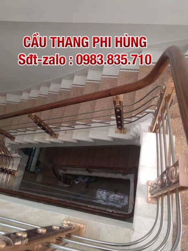 Cầu thang inox tay vịn gỗ, lan can inox tay vịn gỗ tại Hà Nội