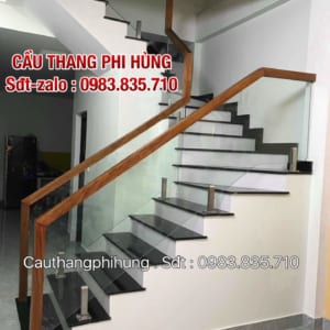 Cầu thang kính tay vịn gỗ, cầu thang kính cường lực, báo giá cầu thang lan can kính cường lực tại Hà Nội Cầu thang kính tay vịn gỗ, cầu thang kính cường lực, báo giá cầu thang lan can kính cường lực tại Hà Nội