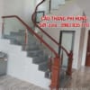 Cầu thang kính gỗ đẹp tại Hà Nội, Cầu thang kính cường lực tay vịn gỗ tại Hà Nội
