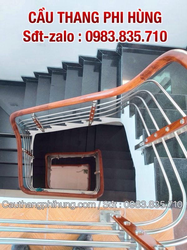 Tổng hợp các mẫu cầu thang inox, Cầu thang inox tay vịn gỗ đẹp nhất tại Hà Nội